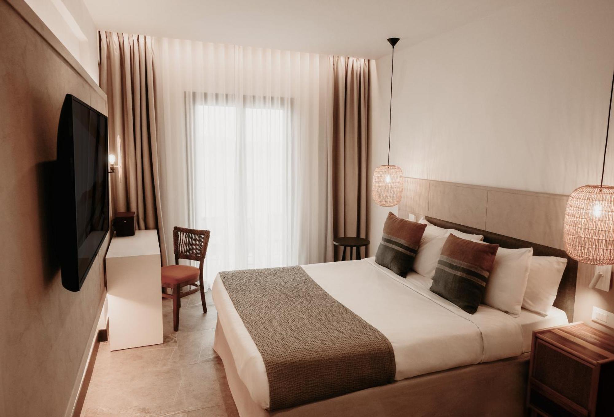 Domes Aulus Elounda All-Inclusive Resort, Adults Only, Curio By Hilton Bagian luar foto